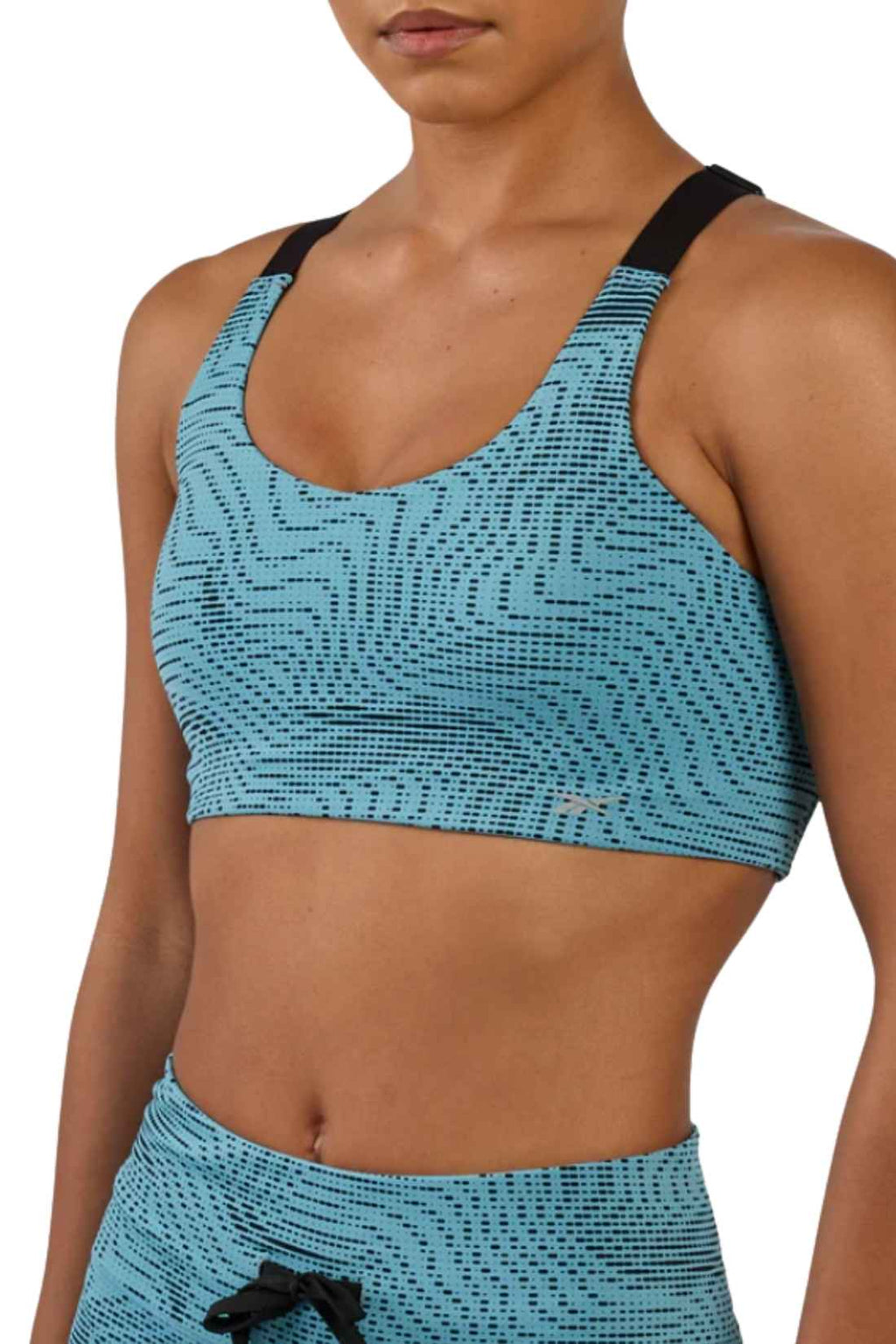 Light blue patterned nylon women's running sports bra with adjustable straps and rowing style back — view 4