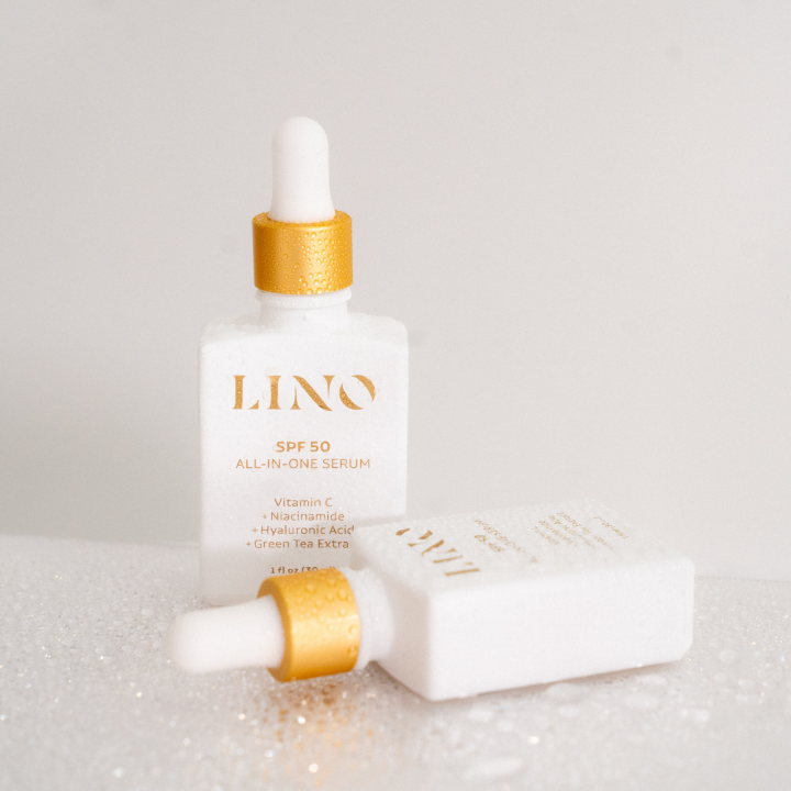 All-in-one face serum with SPF 50 and vitamin c in a sleek minimalist pump bottle. — view 5