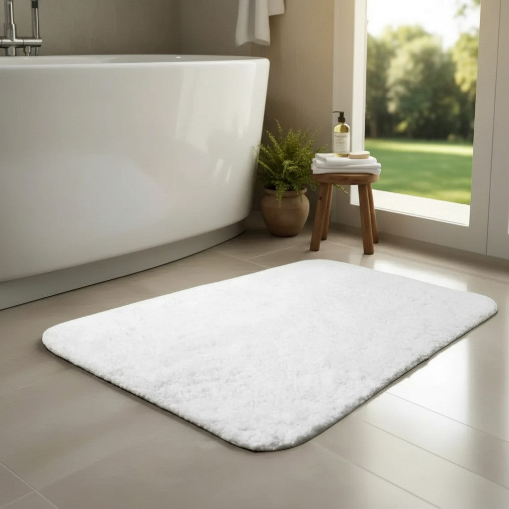 100 percent cotton tufted bath rug with a vintage fringe texture on a bathroom floor