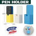 Magnetic pen holder box in durable plastic attached to a white refrigerator storing office supplies
