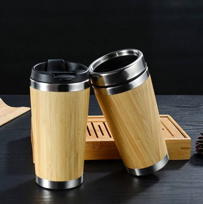 Leakproof bamboo travel mug with stainless steel interior and non-slip silicone base