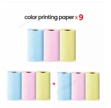 White portable mini thermal pocket printer dispensing a sticky label for home office organization — view 2