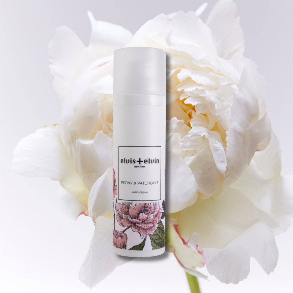 Peony and patchouli hand cream in an elegant cosmetic tube with clean modern luxury packaging — view 4