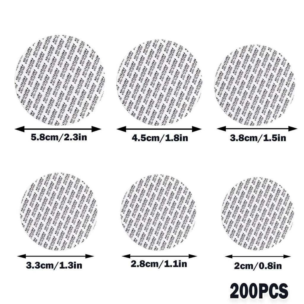 White pressure-sensitive foam bottle cap liners arranged in a neat pile for jar sealing — view 3