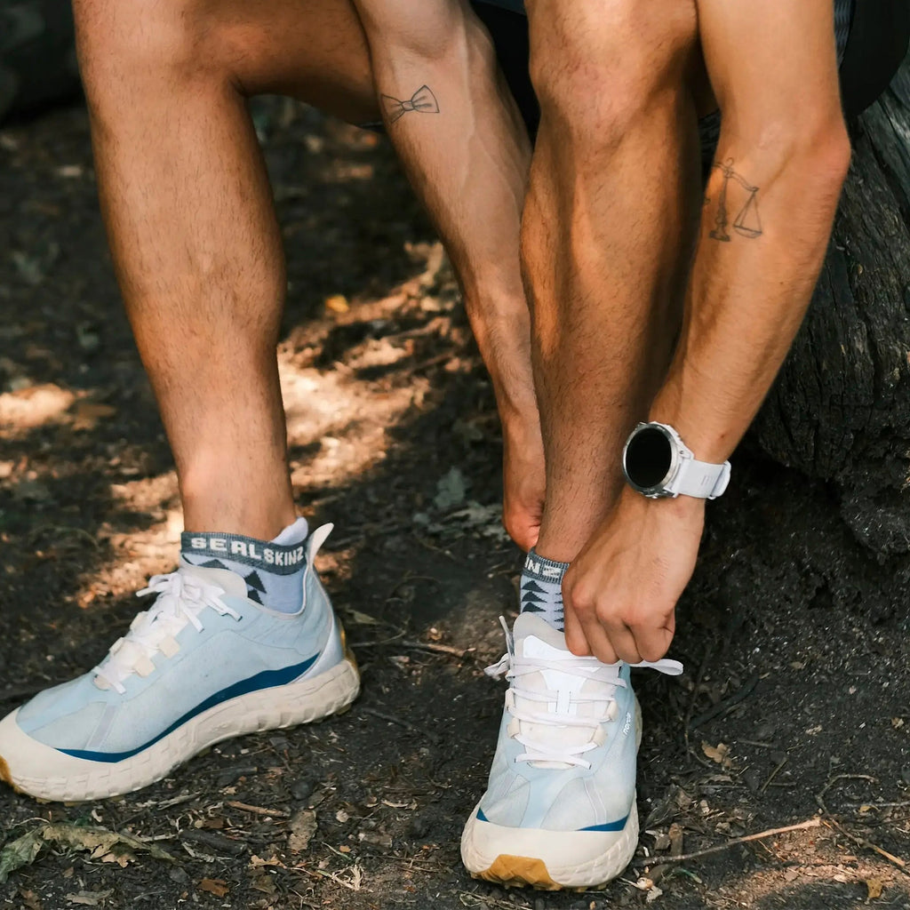 Pair of Merino wool anklet running socks with cushioned heel and ergonomic athletic design — view 3