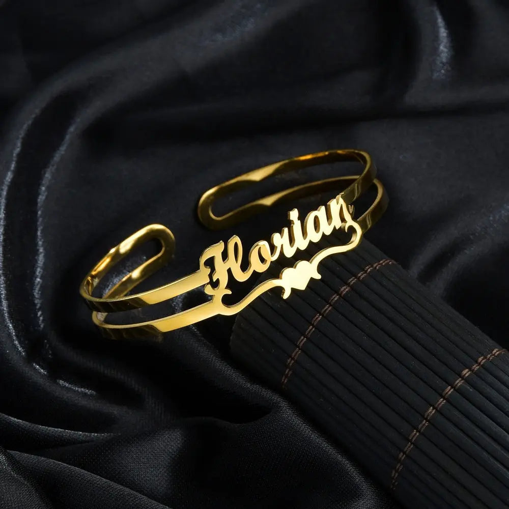 Personalized name bracelet in polished stainless steel available in silver gold and rose gold finishes — view 5