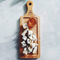 Rectangular organic bamboo serving tray with handle for appetizers and barbecue sides