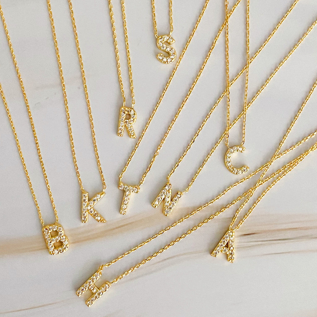 18k gold plated initial necklace with cubic zirconia stones on a delicate chain — view 5