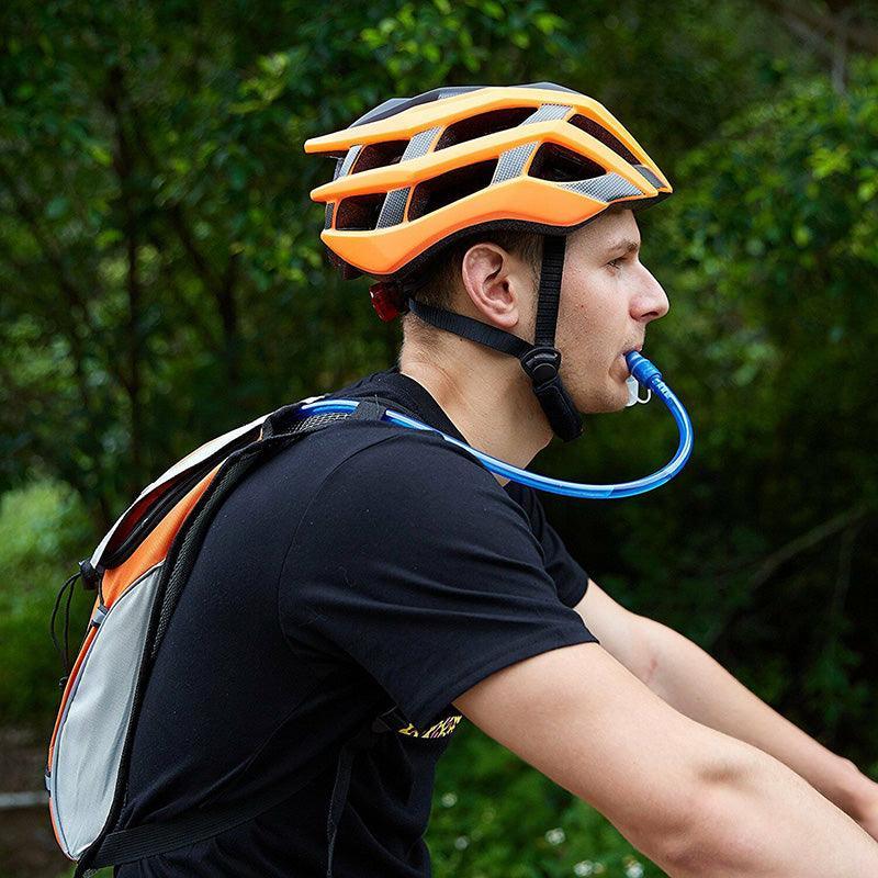 Lightweight nylon hydration backpack with two liter water bladder and adjustable shoulder straps — view 4