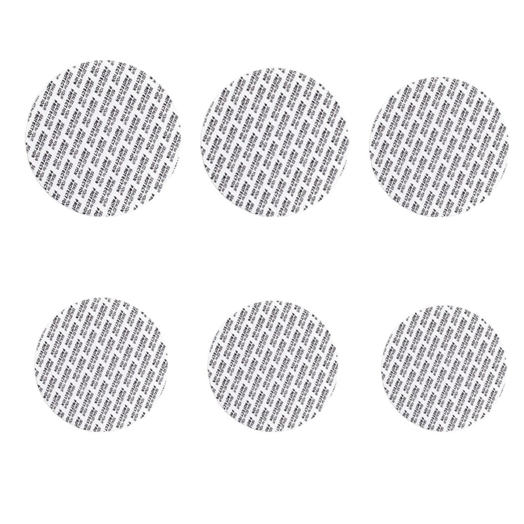 White pressure-sensitive foam bottle cap liners arranged in a neat pile for jar sealing — view 2