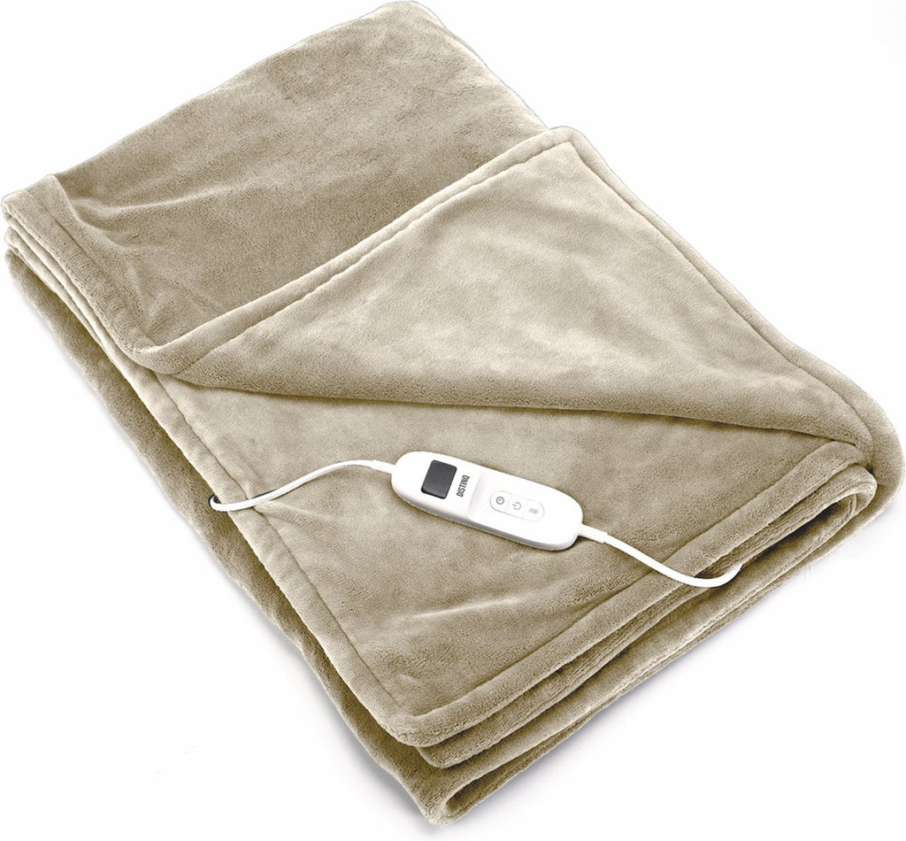 Extra-large beige flannel fleece electric blanket spread neatly over a comfortable couch