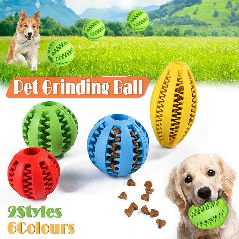 Rubber dog chew toy ball treat dispenser in vibrant colours with textured teeth cleaning surface