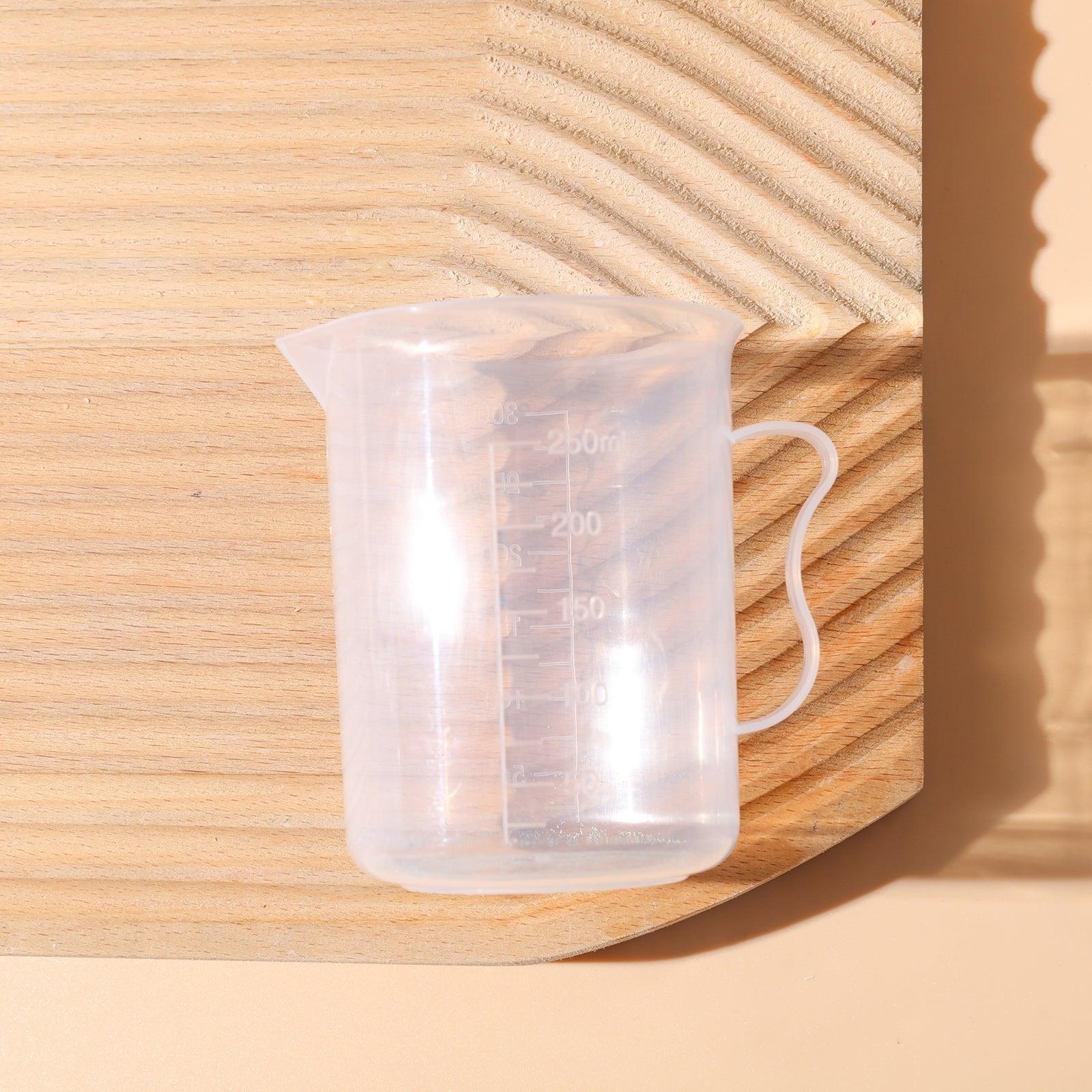 Clear 300ml measuring cup with graduation marks for precise kitchen baking and crafting
