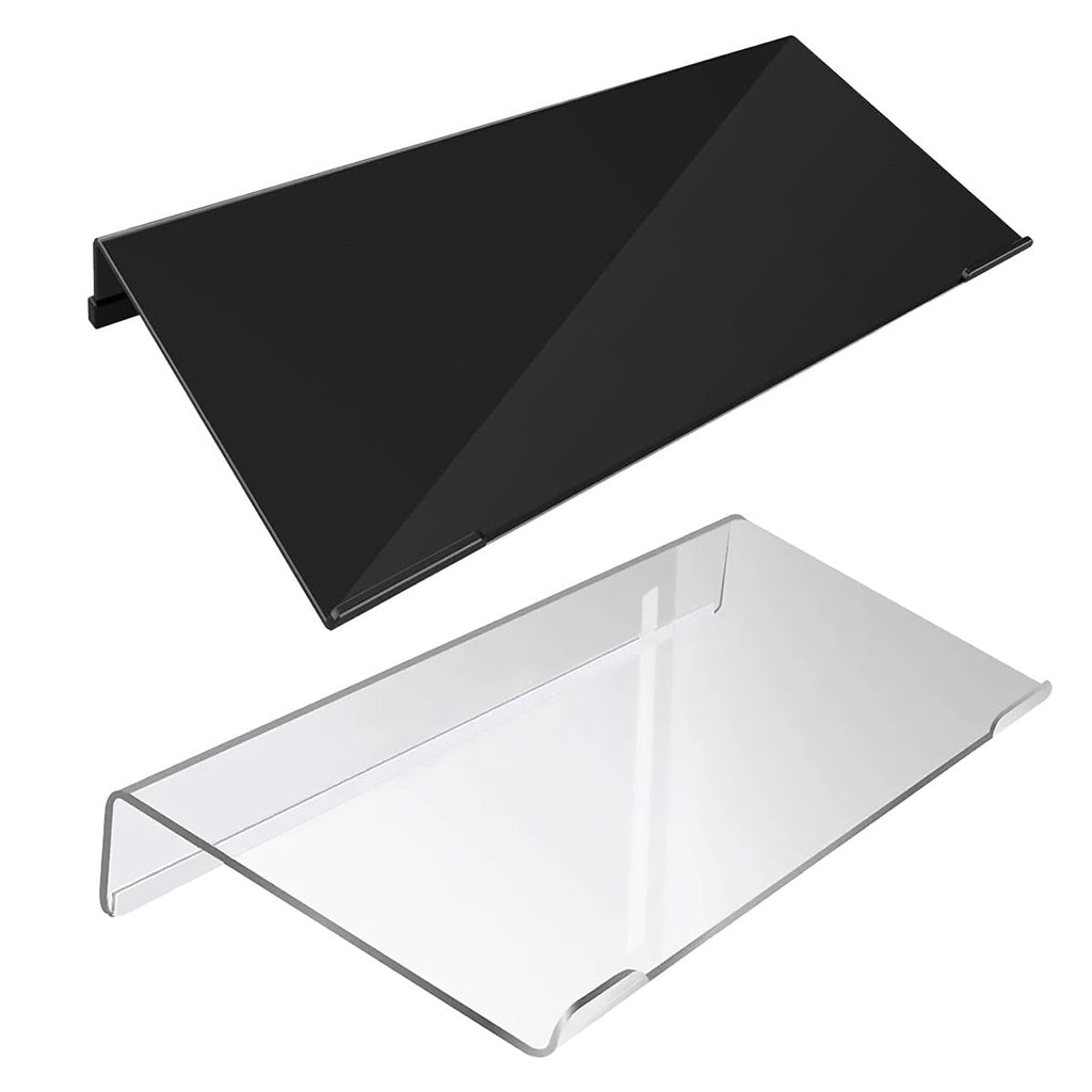 Transparent tilted acrylic keyboard stand supporting a compact black mechanical keyboard on a desk — view 2