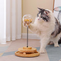 Interactive wooden and plastic cat treat dispenser puzzle ball toy for engaging indoor cats