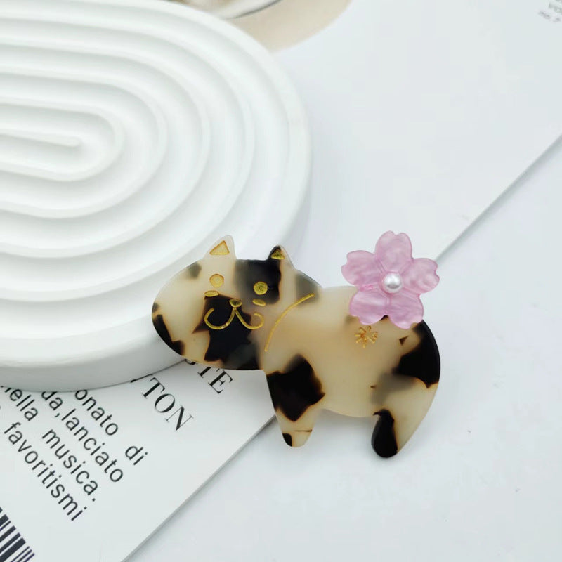 Hand-painted floral cat hair clip in eco-friendly cellulose acetate with glass rhinestones and alligator grip — view 4