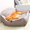 Plush polyester luxury sofa dog bed in a neutral color with cozy raised edges