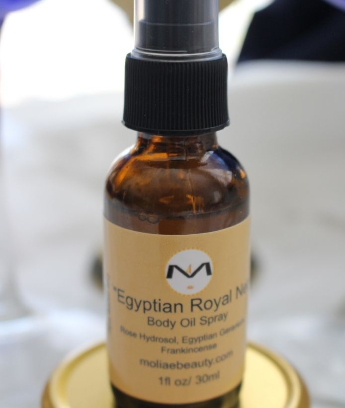 Egyptian Royal Netru Body Oil Spray bottle with rose, frankincense, and geranium natural skin nourishment