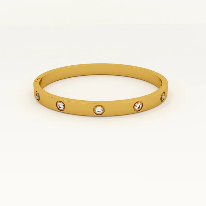 Crystal Love Bangle Bracelet with heart shaped crystal centerpiece and polished metallic adjustable band — view 2