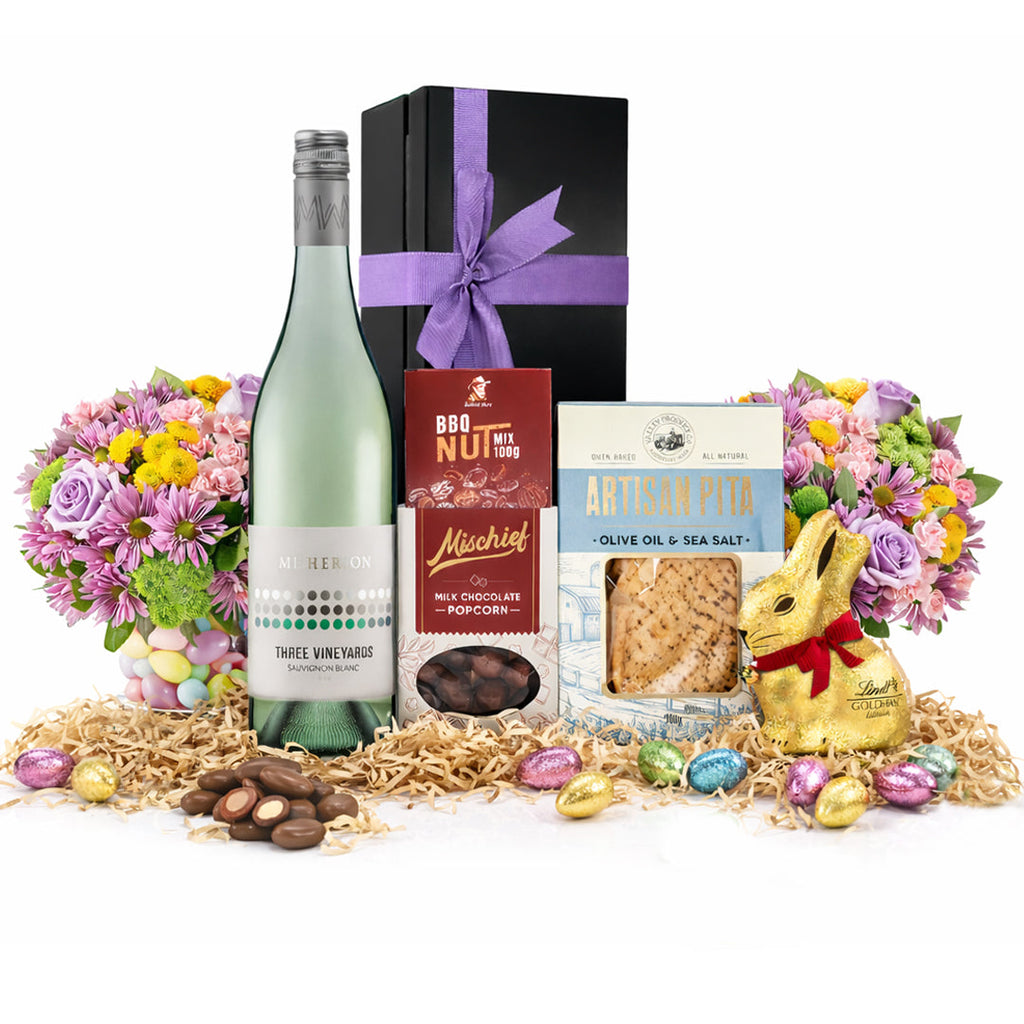 Premium Sauvignon Blanc and Easter chocolate gourmet hamper arranged in a sleek black magnetic gift box