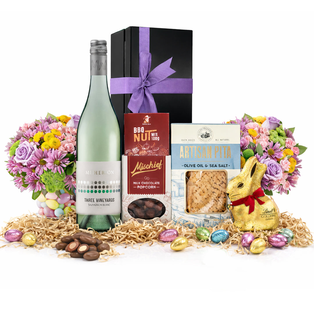 Premium Sauvignon Blanc and Easter chocolate gourmet hamper arranged in a sleek black magnetic gift box