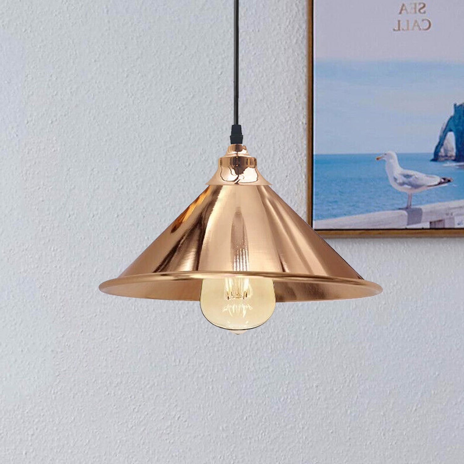 French gold dome pendant light with adjustable black cable and metal ceiling rose plate.