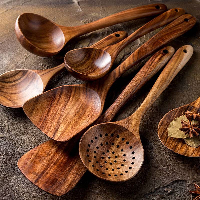Natural teak wood kitchen utensil set including spoon, ladle, and turner with smooth wood grain — view 4