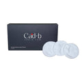 Reusable bamboo cotton rounds makeup remover pads, stack of 12 white circular organic facial wipes.