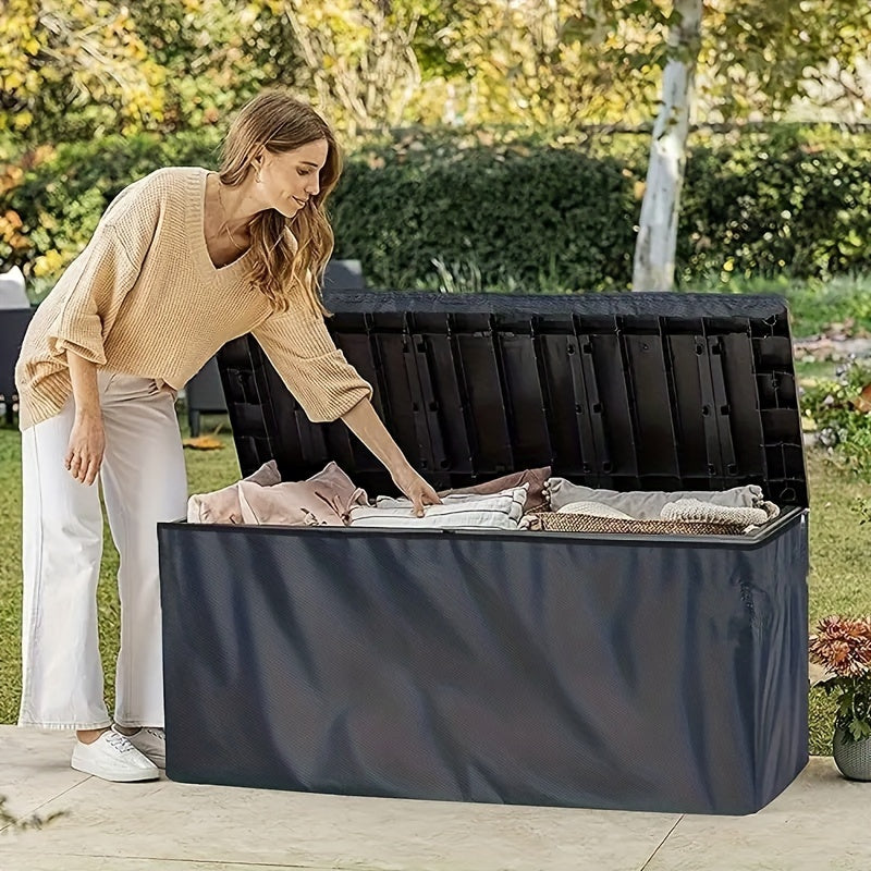 Black deck box cover made of waterproof 210D fabric protecting a rectangular outdoor patio storage unit — view 4