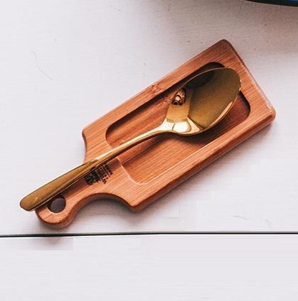 Rectangular natural bamboo serving tray with handle for presenting small appetizers and side dishes