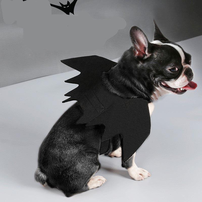 Black felt bat wings dog costume featuring adjustable Velcro straps on a white background — view 5