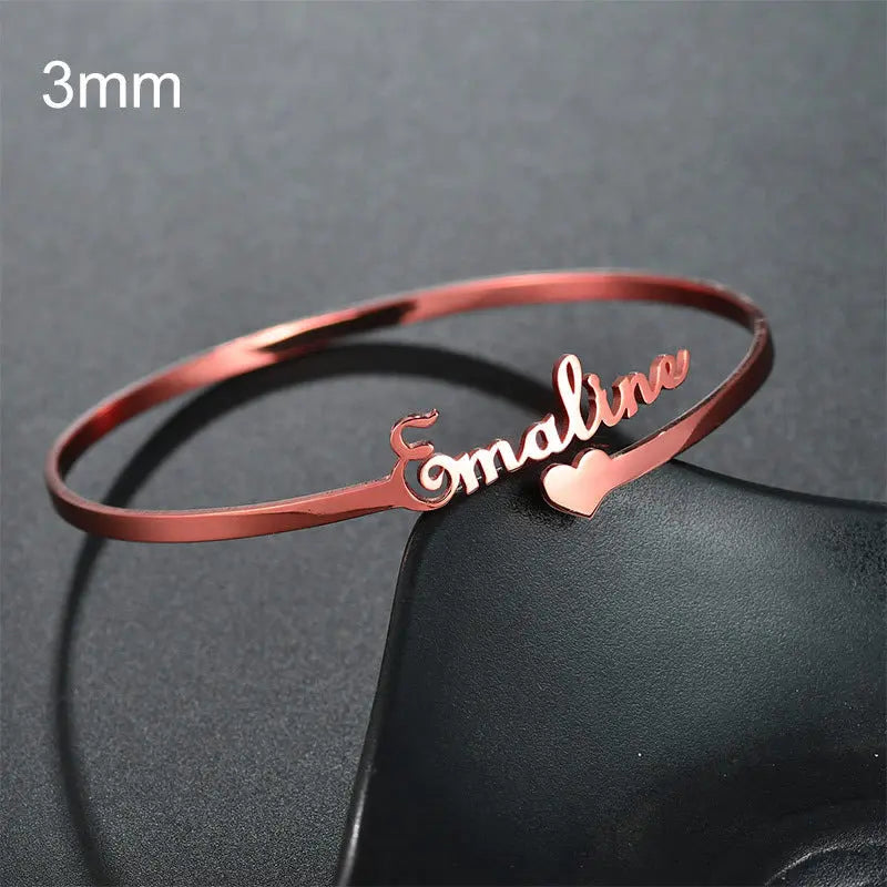 Personalized name bracelet in polished stainless steel available in silver gold and rose gold finishes — view 2