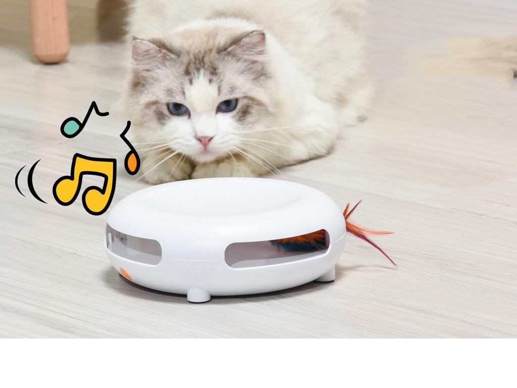 White and orange plastic interactive cat toy entertainment center with dangling playful feathers