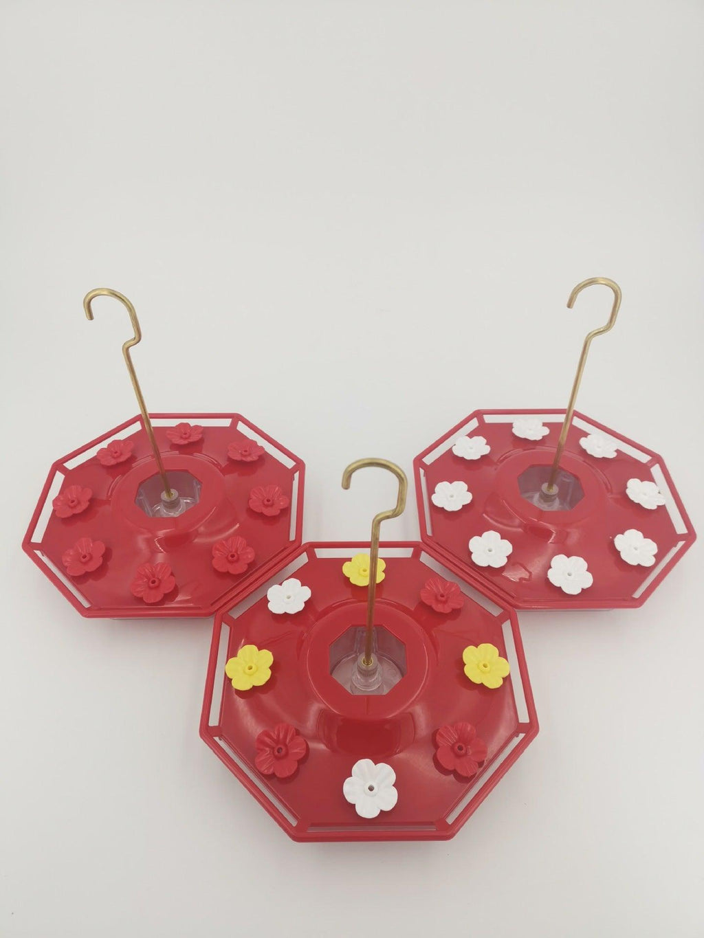 Enchanting Blooms hummingbird feeder with eight flower ports and copper hanging hook