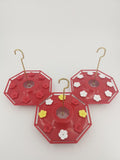 Enchanting Blooms hummingbird feeder with eight flower ports and copper hanging hook