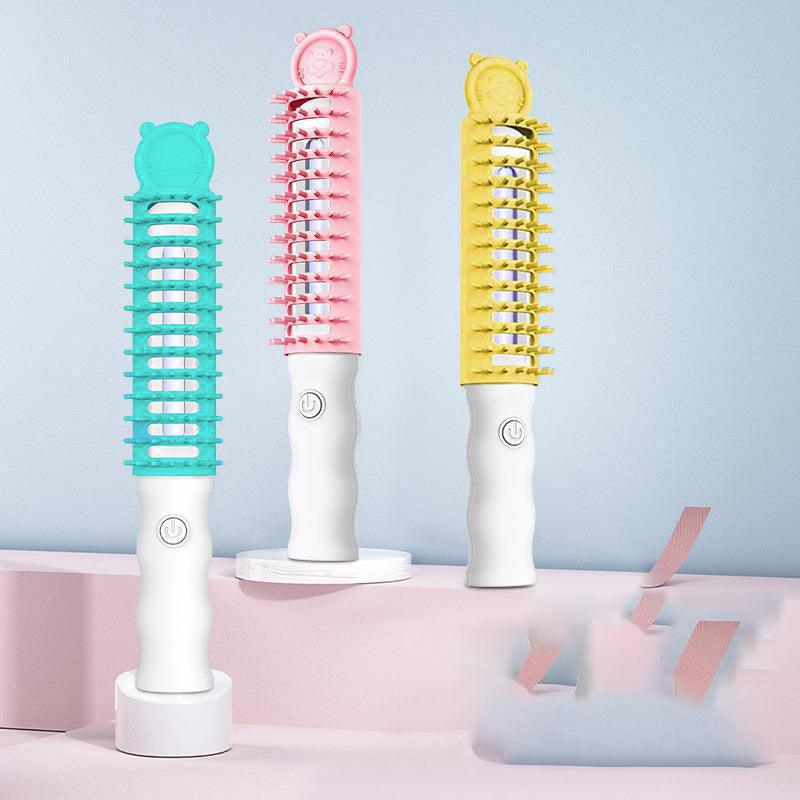Ozone pet grooming brush in colorful plastic with ergonomic handle for shedding and odor control — view 5