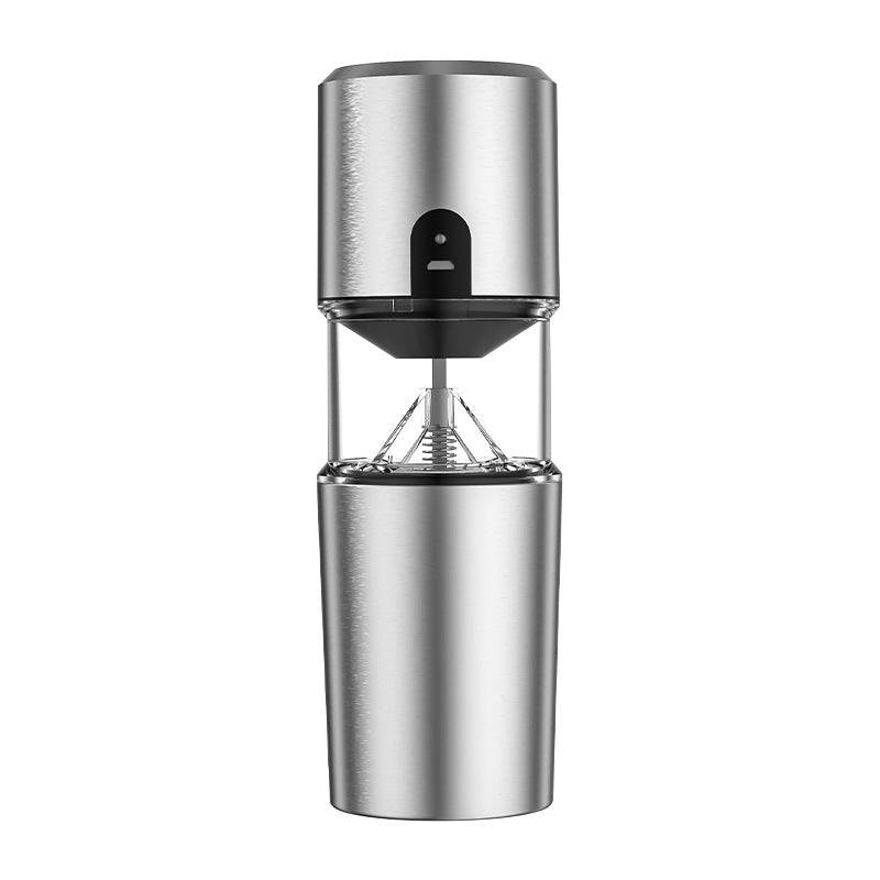 Compact portable electric coffee grinder featuring ceramic burrs and a sleek ergonomic body for travel use.