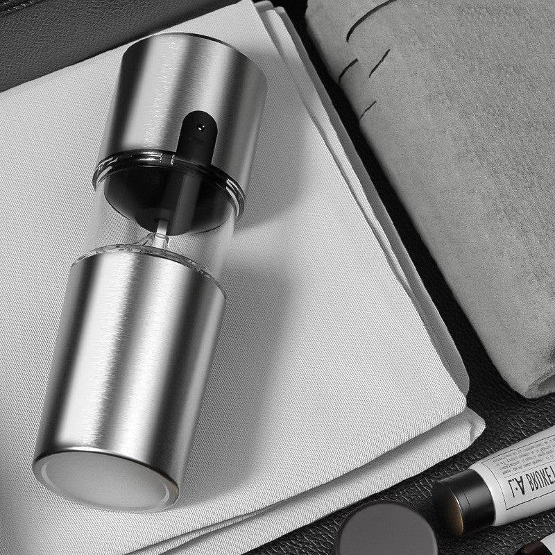Compact portable electric coffee grinder featuring ceramic burrs and a sleek ergonomic body for travel use. — view 2