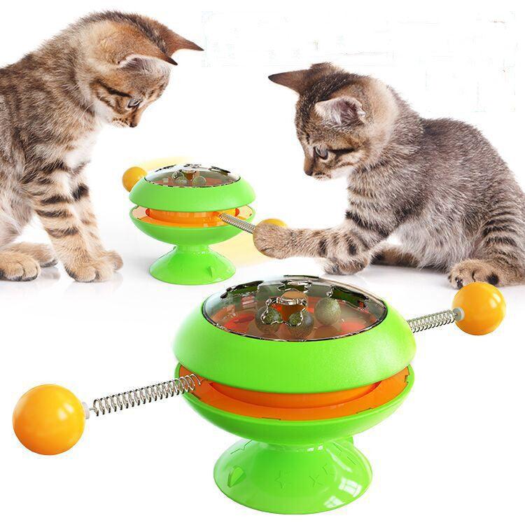 Interactive rotatable plastic cat toy with built in catnip balls and large suction cup base — view 2