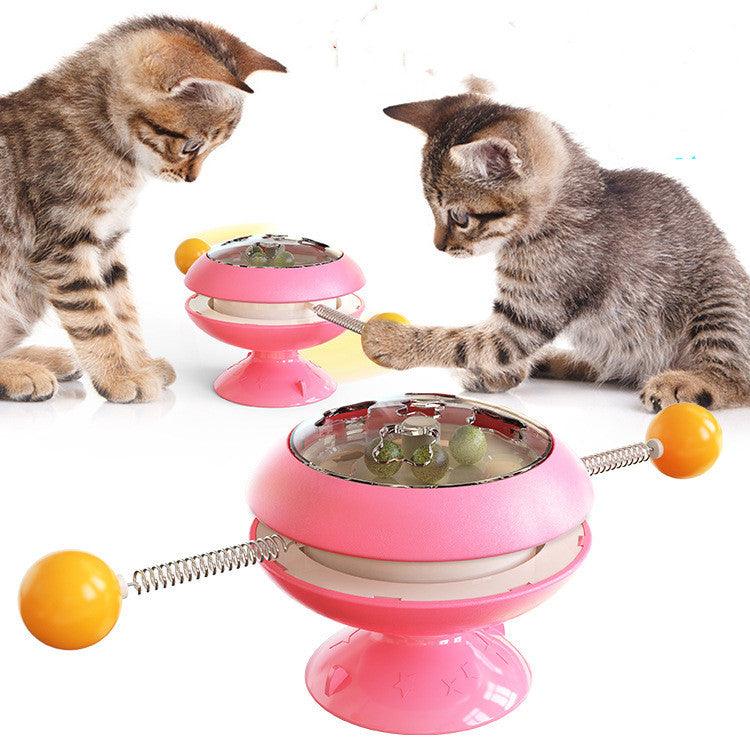 Interactive rotatable plastic cat toy with built in catnip balls and large suction cup base — view 4