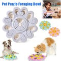 Interactive dog treat puzzle bowl in durable ABS plastic featuring slow feeder treat dispensing compartments