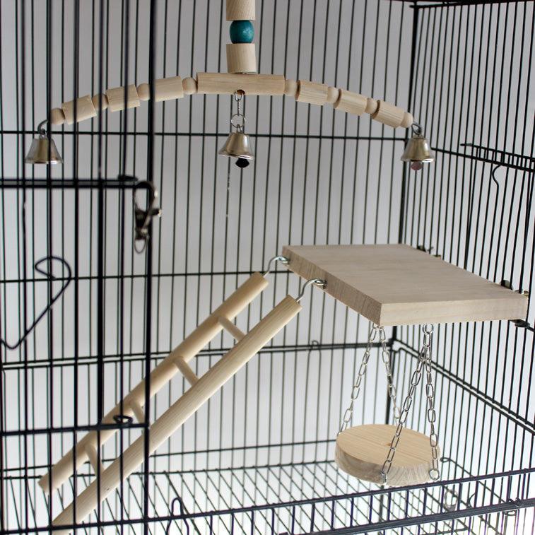 Natural wooden interactive bird toy jungle gym featuring a pedal swing ladder and small dangling bell