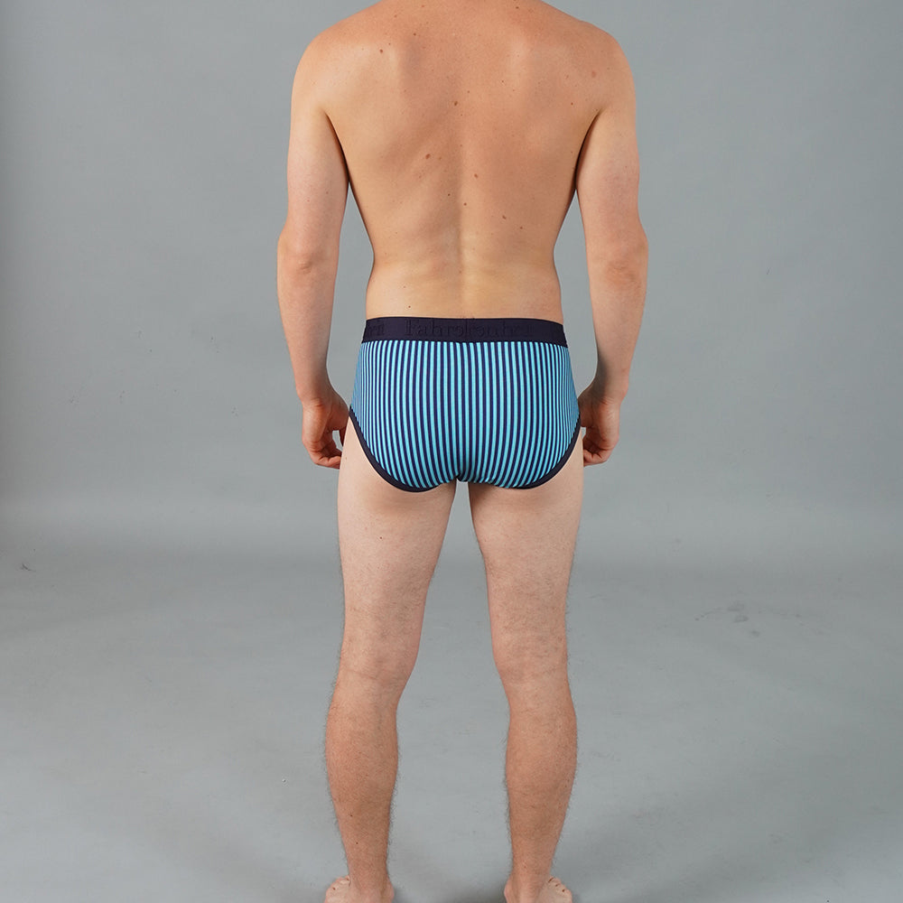 Three pack of solid blue mens cotton briefs with smooth logo waistband — view 3