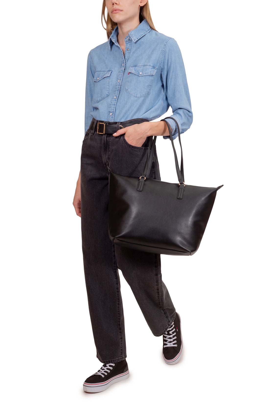 Women's light blue wash denim shirt with snap buttons, long sleeves, and front flap pockets. — view 8