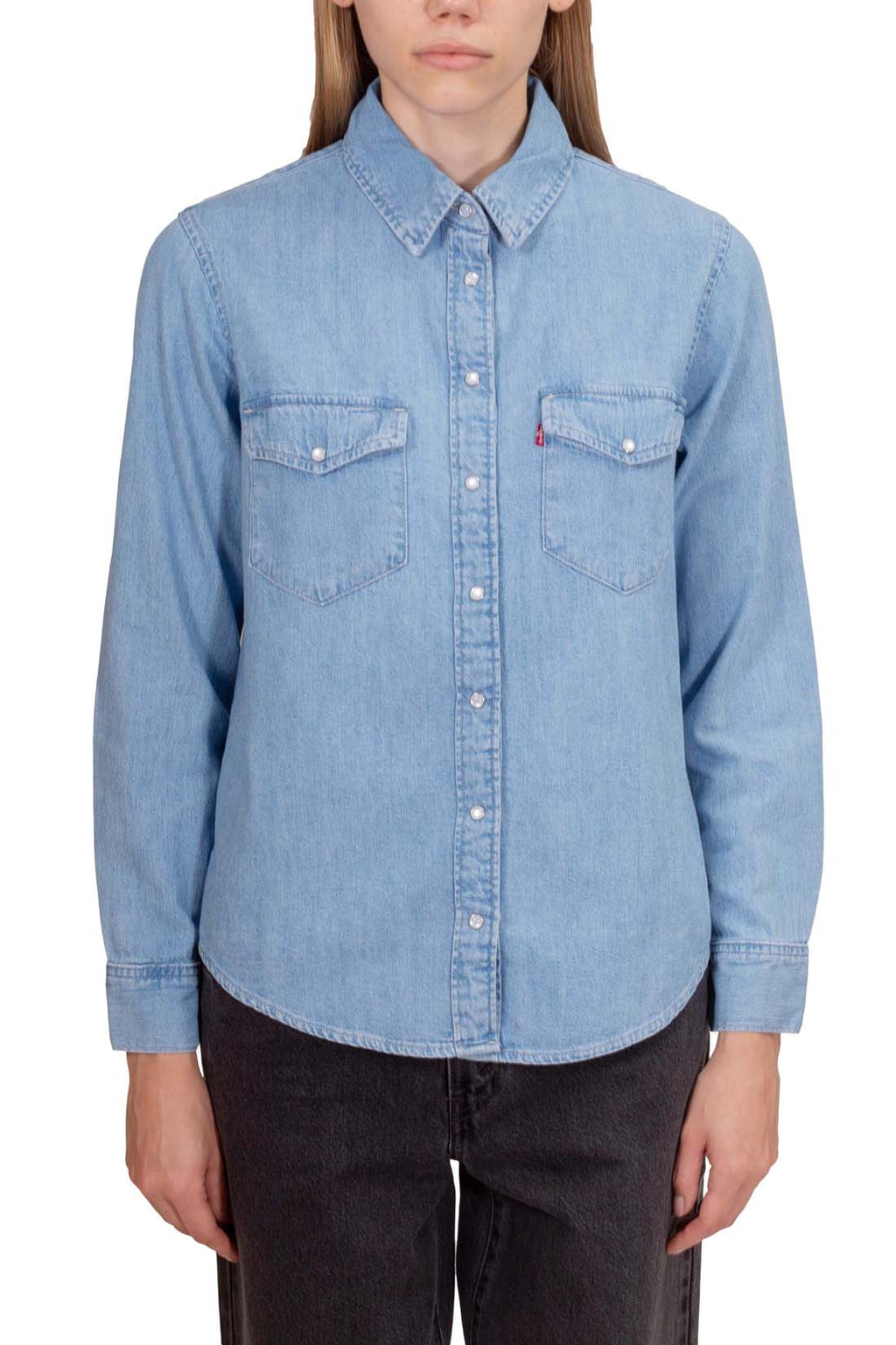 Women's light blue wash denim shirt with snap buttons, long sleeves, and front flap pockets. — view 6