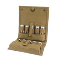 Outdoor seasoning bottles set in a khaki canvas travel bag with clear glass spice jars