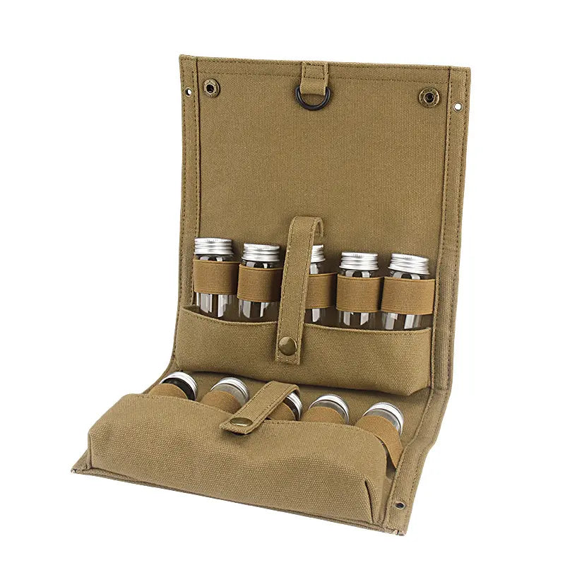 Outdoor seasoning bottles set in a khaki canvas travel bag with clear glass spice jars