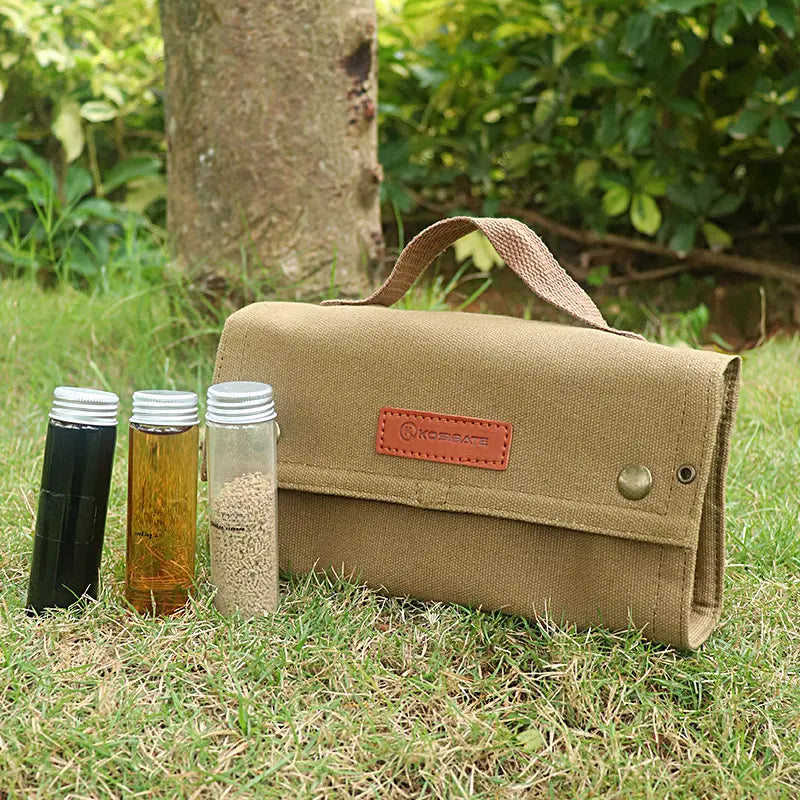 Outdoor seasoning bottles set in a khaki canvas travel bag with clear glass spice jars — view 5