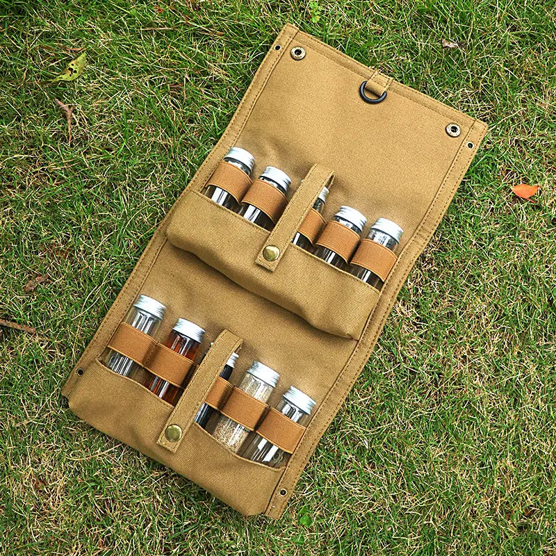 Outdoor seasoning bottles set in a khaki canvas travel bag with clear glass spice jars — view 3