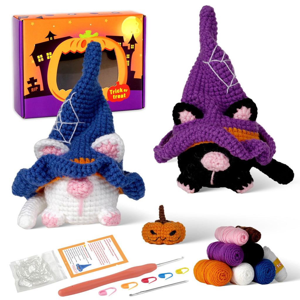 Halloween cat gnome amigurumi crochet kit with wizard hat, pumpkin, and crafting materials on display